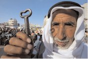 Palestinian refugee Mohamad Mahmoud Al-Arja, 80, still has the key from his house in Beer AI-saba, which is now inside Israel.